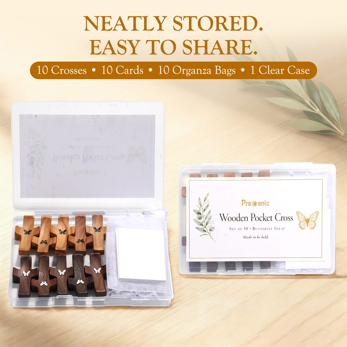 The clear storage case holding ten crosses, ten blessing cards and ten organza bags